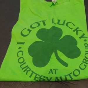 Green shamrock I got Lucky.  Courtesy Auto Group.